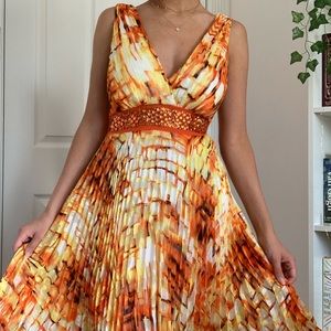 Orange pleated summer dress